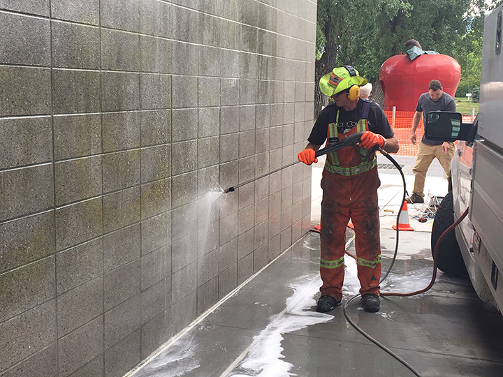City of Kelowna crews began washing the graffiti away on Tuesday morning.