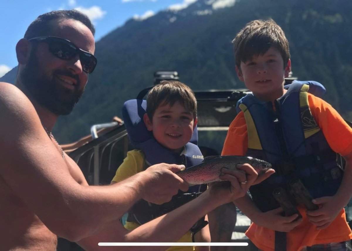 Nicholas Trask is seen here with his sons, Vincent and Evan.