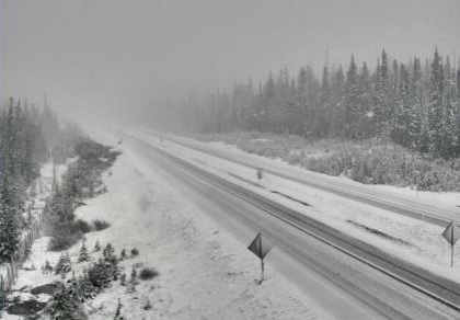 Highway Cam footage shows snow falling on Highway 97C near the Pennask Summit at 7:30 Sunday morning. 