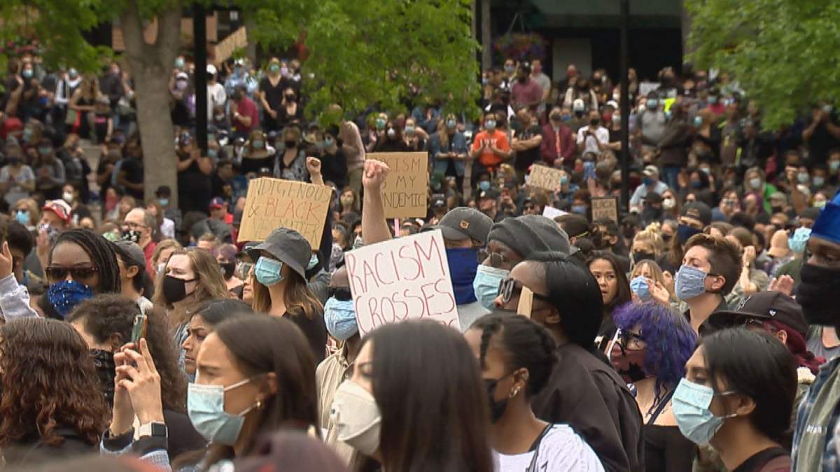 Calgarians turned out to stand in solidarity with Black Lives Matter at a rally in Olympic Plaza on Saturday, June 6, 2020.