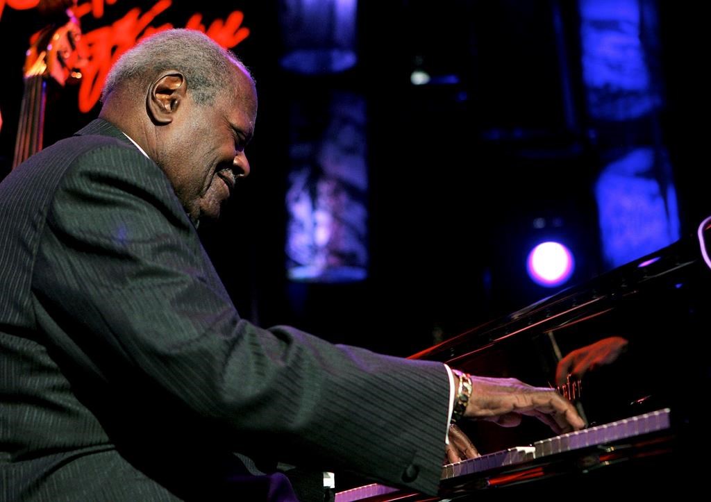 Canadian jazz legend Oscar Peterson performs on the Stravinski hall stage during the 39th Montreux Jazz Festival in Montreux, Switzerland, Saturday, July 16, 2005.