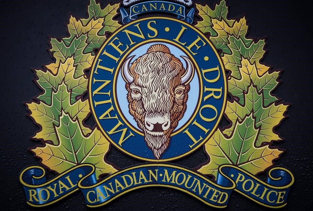 The RCMP logo is seen outside Royal Canadian Mounted Police "E" Division Headquarters, in Surrey, B.C., on Friday April 13, 2018.
