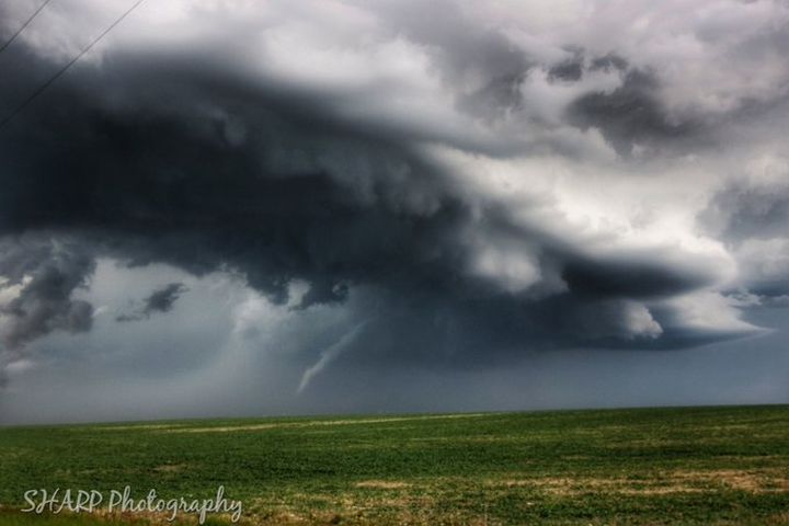 A photo of a funnel cloud by Chin Lakes, Alta, taken at 8:01 p.m. on June 13.