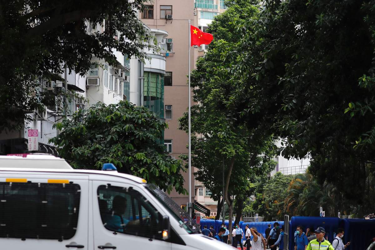 The Chinese national flag flies on a flagstaff after the opening ceremony of a temporary national security office, in Hong Kong, China July 8, 2020. 