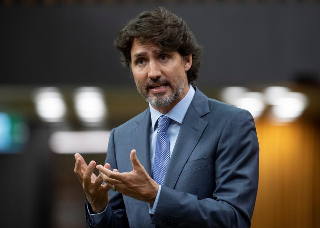 Prime Minister Justin Trudeau rises during a sitting of the Special Committee on the COVID-19 Pandemic in the House of Commons Wednesday July 22, 2020 in Ottawa. Members of the House of Commons finance committee will meet this afternoon to figure out the details of Trudeau's planned testimony.