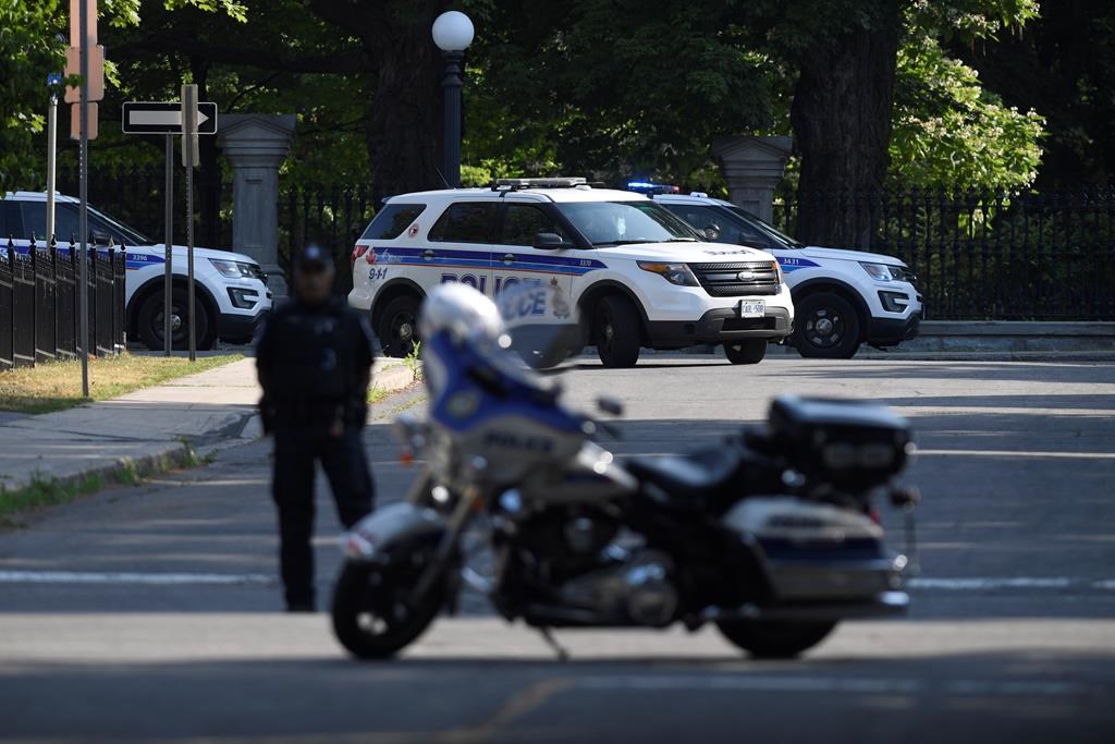 A police barricade is set up near Rideau Hall in Ottawa on Thursday, July 2, 2020. The RCMP say they have safely resolved an “incident” at Rideau Hall, where Gov. Gen. Julie Payette and Prime Minister Justin Trudeau live.