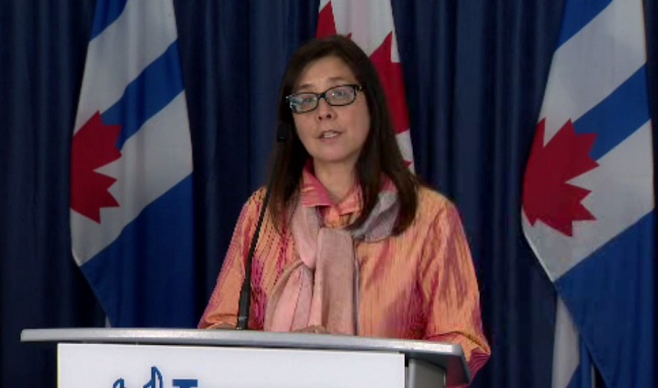 Dr. Eileen de Villa speaks at Toronto city hall on Thursday.