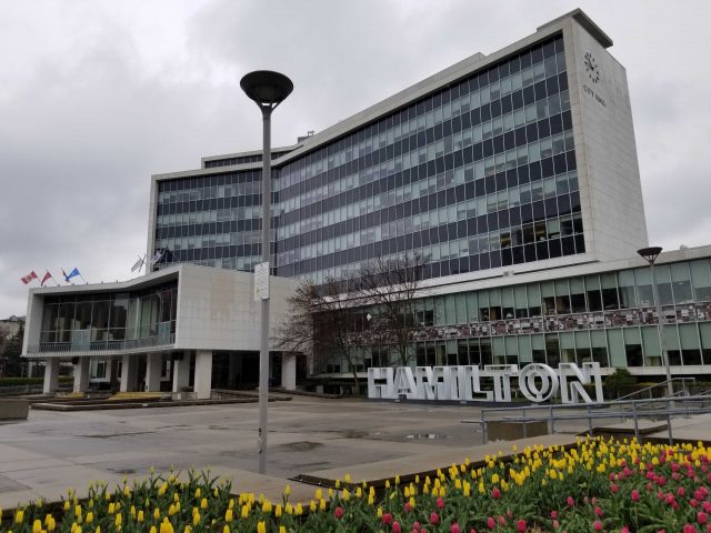 A proposal to install removable metal poles around the city hall forecourt will undergo further study.