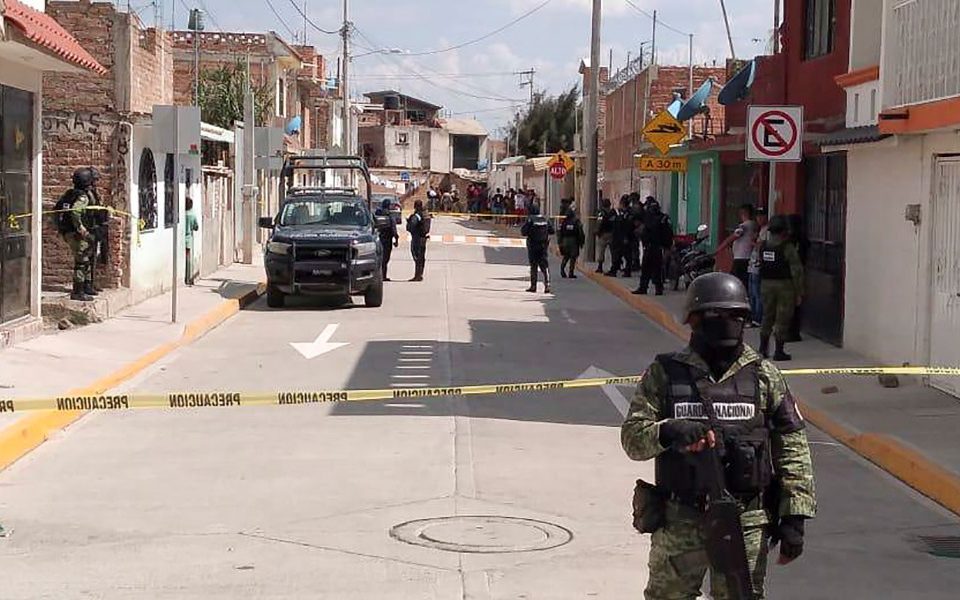 Members of the National Guard protect the area where 10 people were killed in the municipality of Irapuato, Guanajuato state, Mexico, June 6, 2020. Twenty-four more people were killed in a shooting at a drug rehab facility in Irapuato on July 1, 2020, though it was not immediately clear if it was the same facility as the June attack.