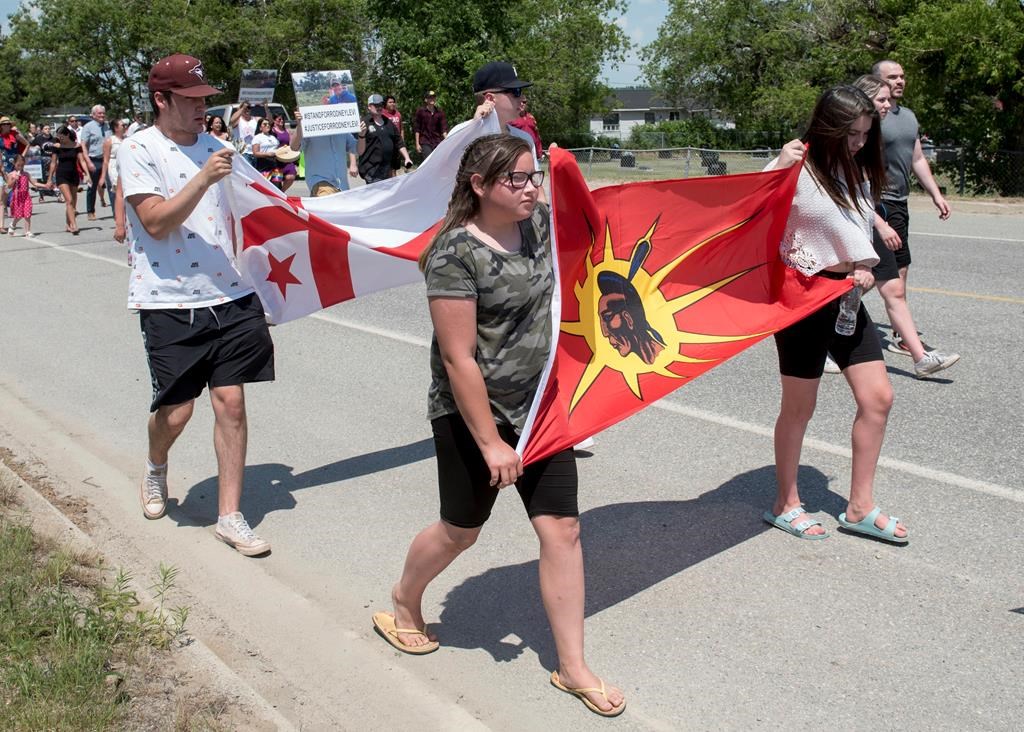 People walk to honour Rodney Levi in Red Bank, New Brunswick on Friday June 19, 2020.