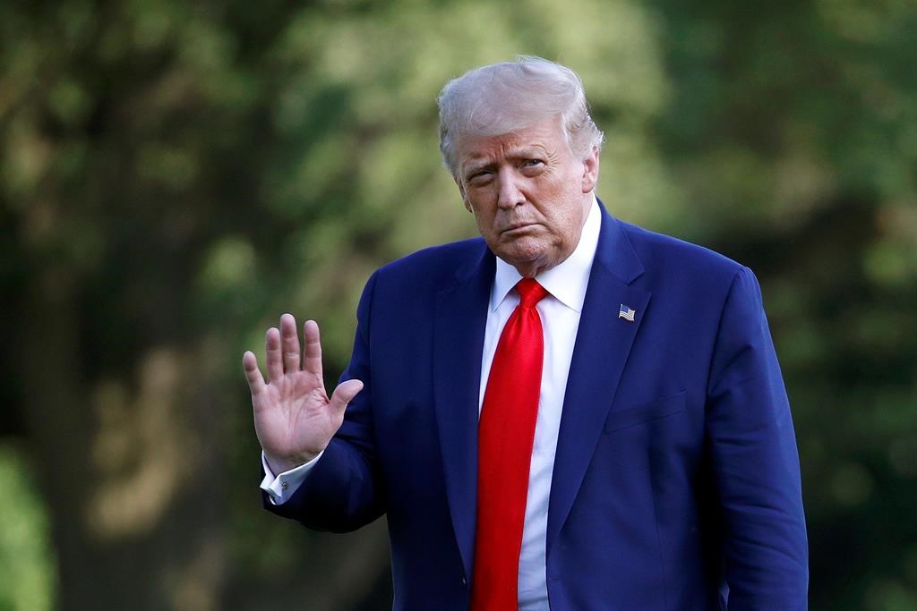 President Donald Trump walks on the South Lawn of the White House in Washington, Wednesday, July 15, 2020, after stepping off Marine One.