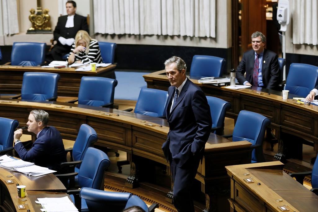 Manitoba Premier Brian Pallister makes his way to his seat during question period. 