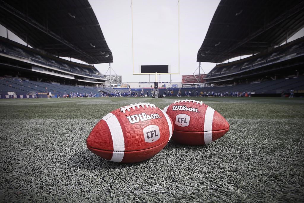 New CFL balls are photographed at the Winnipeg Blue Bombers stadium in Winnipeg Thursday, May 24, 2018. THE CANADIAN PRESS/John Woods.