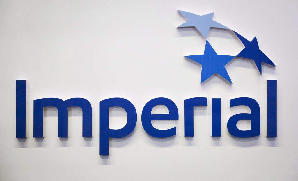 Shares in Imperial Oil Ltd. are trading lower after it beat analyst expectations on oil and gas production but fell well short of second quarter earnings. The Imperial Oil logo is seen at the company's annual meeting in Calgary on April 28, 2017. THE CANADIAN PRESS/Jeff McIntosh.
