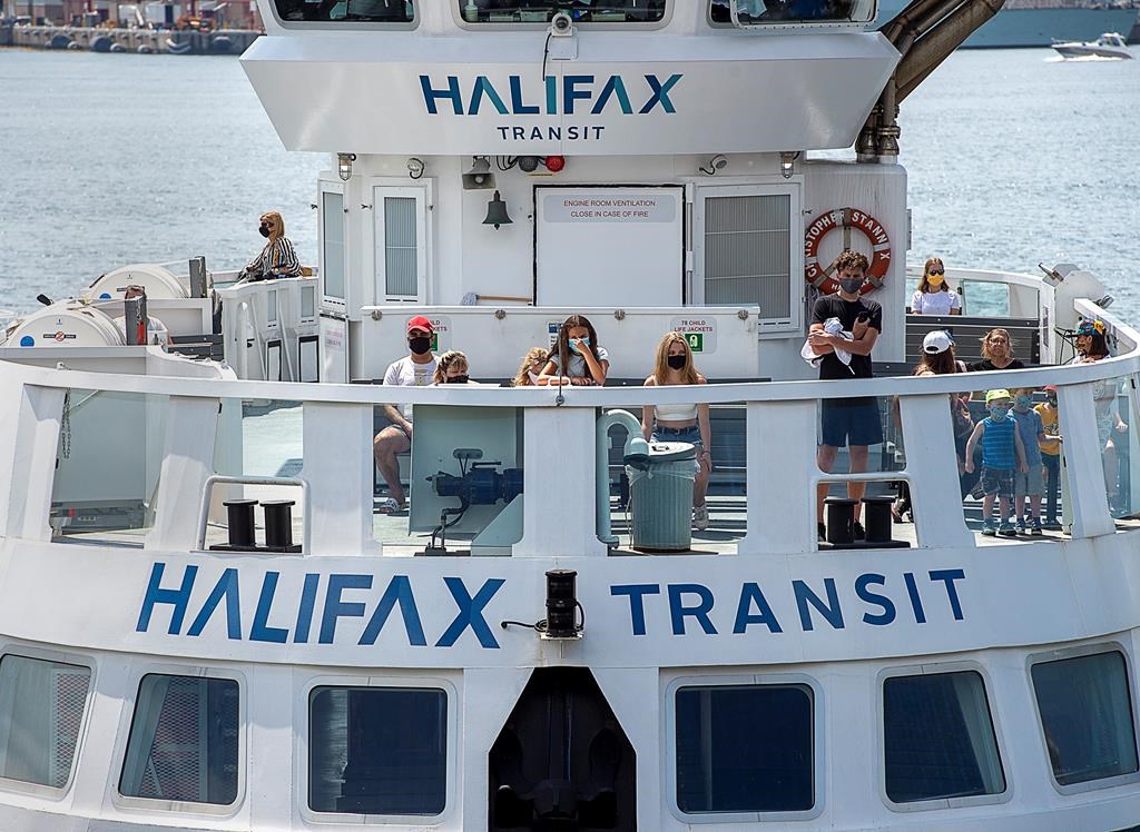 Passengers on a Halifax Transit ferry as it arrives in Dartmouth, N.S. on Friday, July 24, 2020.
