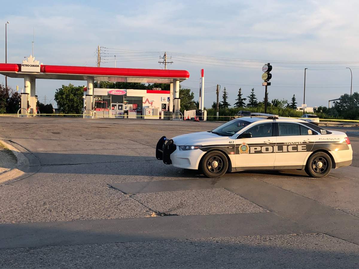 Winnipeg police at the scene on Lagimodiere Boulevard Thursday evening.