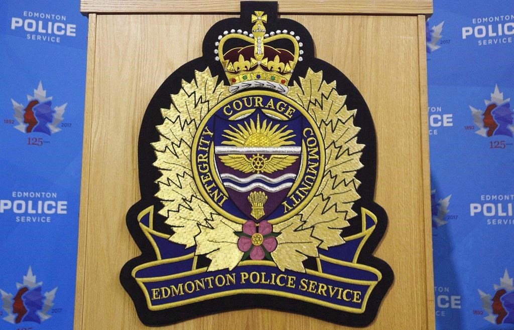 An Edmonton Police Service logo is shown at a press conference in Edmonton, Oct. 2, 2017. 