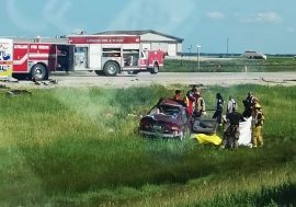 First responders at the crash site south of Letellier Friday afternoon.