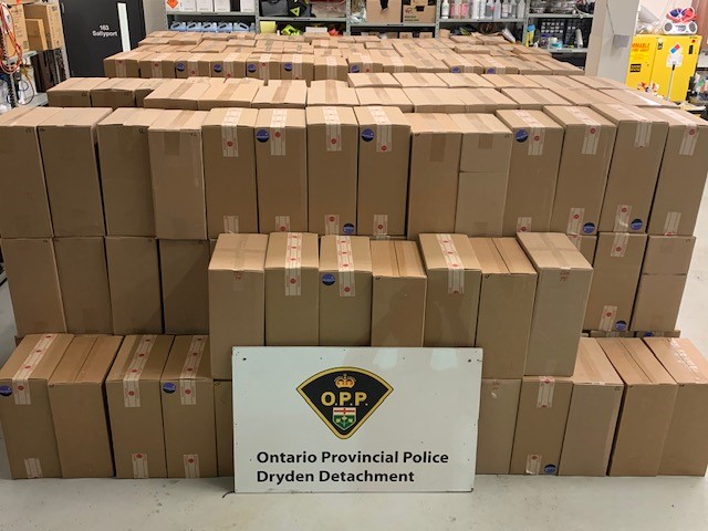 Hundreds of cases of illegal cigarettes Ontario Provincial Police say they discovered during a traffic stop Sunday.