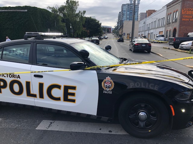 Victoria police respond to a weapons call at a motel-turned-homeless shelter on Friday, July 24, 2020. 