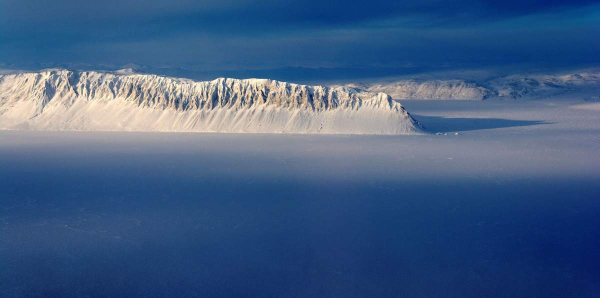 FILE PHOTO: Eureka Sound on Ellesmere Island in the Canadian Arctic is seen in a NASA Operation IceBridge survey picture taken March 25, 2014.