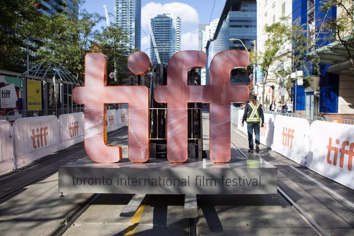 A sign bearing the Toronto International Film Festival logo is carried on a forklift down street in downtown Toronto as preparations are made for the festival's opening night on Thursday September 7, 2017. 