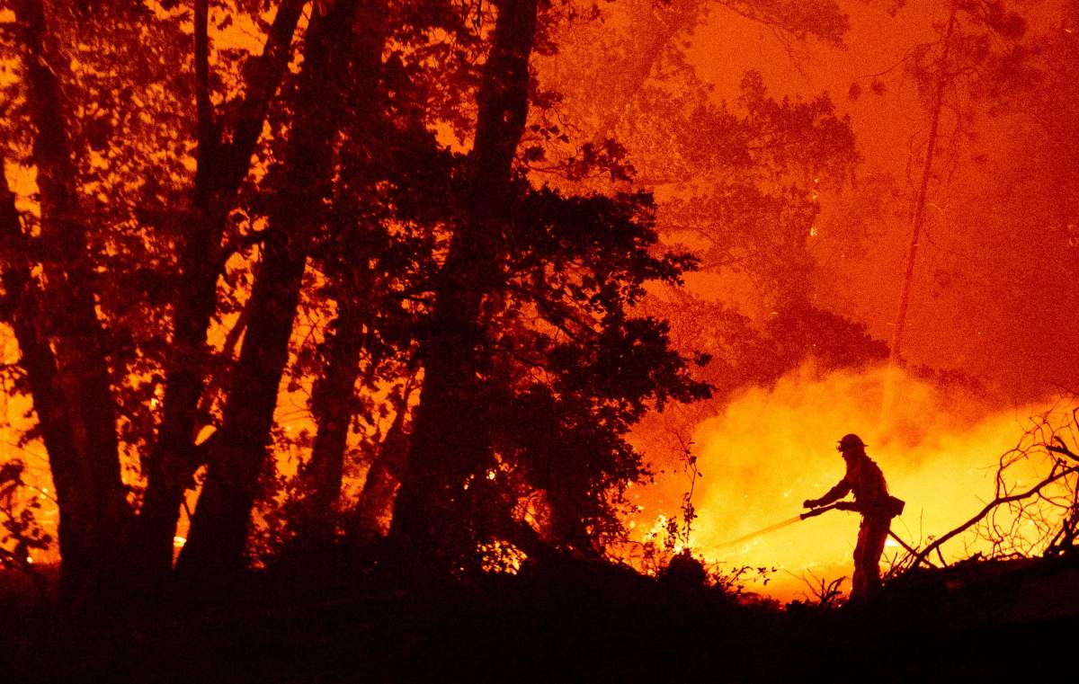 A firework at a gender reveal party triggered a wildfire in southern California that has destroyed 7,000 acres (2,800 hectares) and forced many residents to flee their homes, the fire department said Sunday.