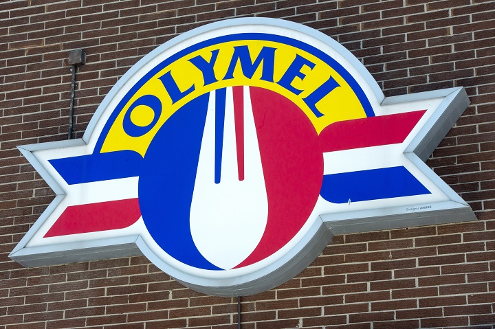 In this March 2020 file photo, an Olymel sign is seen outside a facility in Anjou. So far, 65 workers at an Olymel owned plant in the Beauce region have tested positive for COVID-19. Thursday, Oct. 22, 2020.