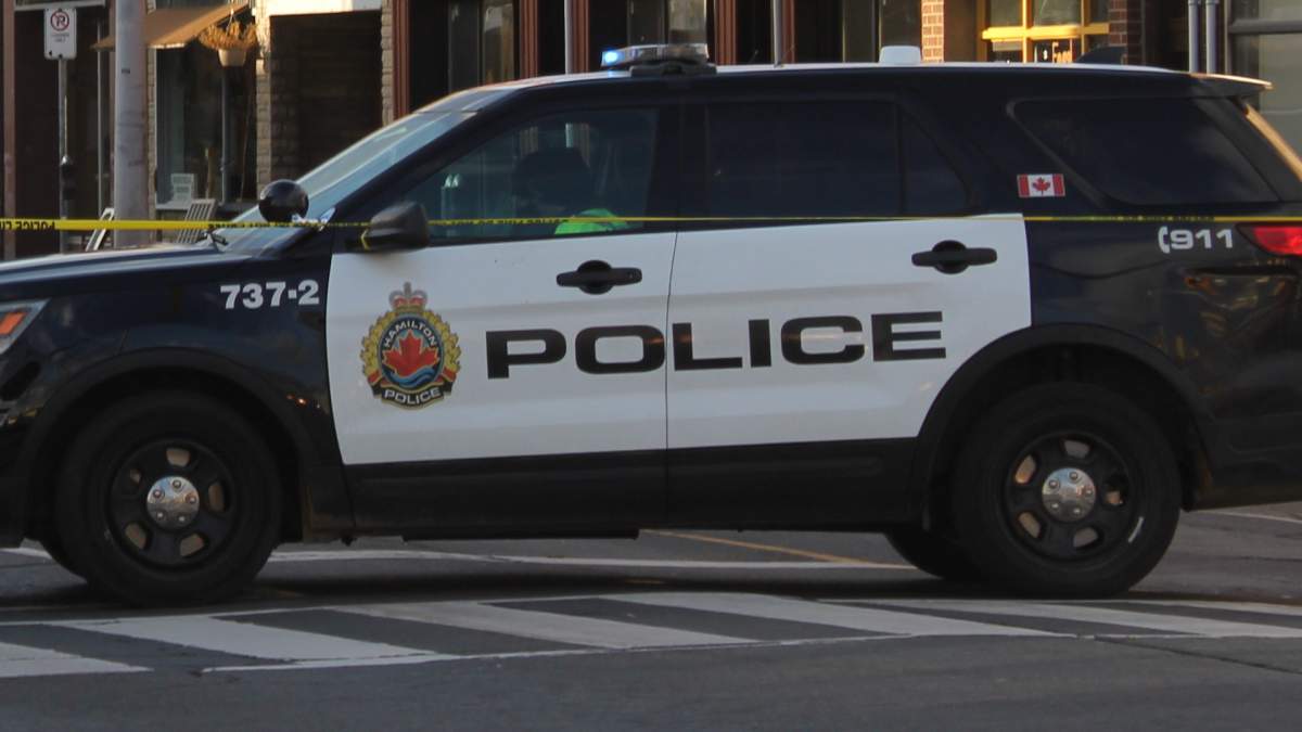 Police say a Hamilton man is facing two charges for allegedly carrying an explosive device in the city's east side on June 26, 2022.