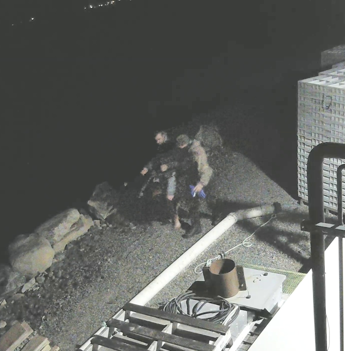 RCMP have released photos and a video they say show persons of interest in the fire that consumed a lobster pound in Middle West Pubnico, N.B., on Oct. 17, 2020.
