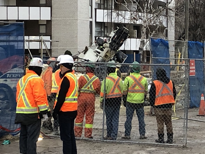 A crane tipped over near the future Mount Pleasant Eglinton-Crosstown station.