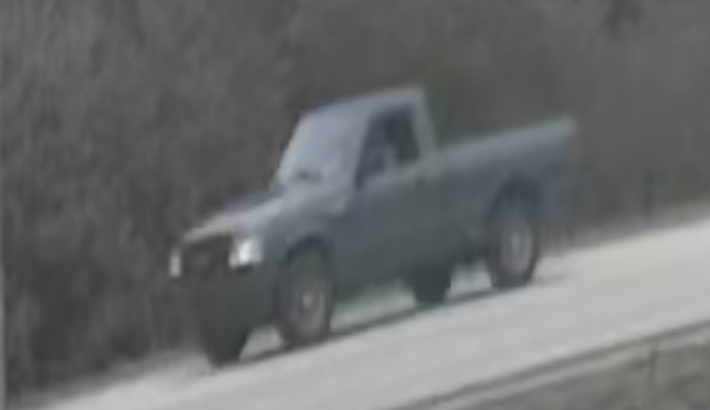Police looking for an older model of a small silver sedan with a black rear bumper.