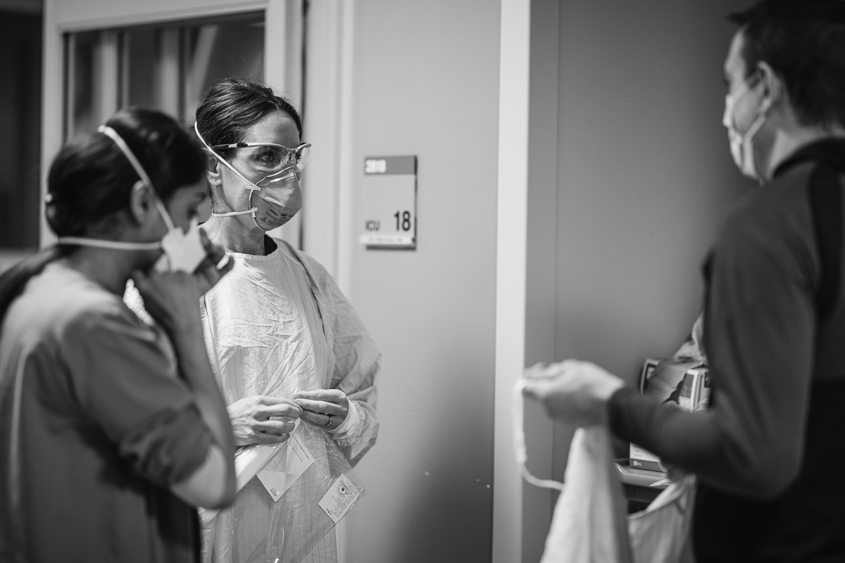 Dr. Dorrington speaking with colleagues.