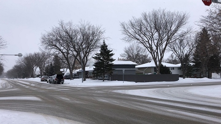 A 74-year-old woman died after being hit by a vehicle at the intersection of McIntosh Street North and Dalgliesh Drive on Wednesday night. 