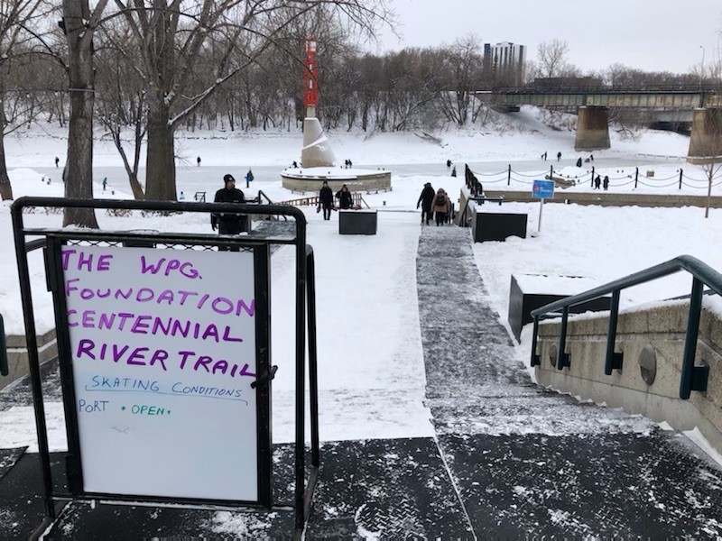 Skaters are enjoying the river trail at The Forks on January 1, 2021.