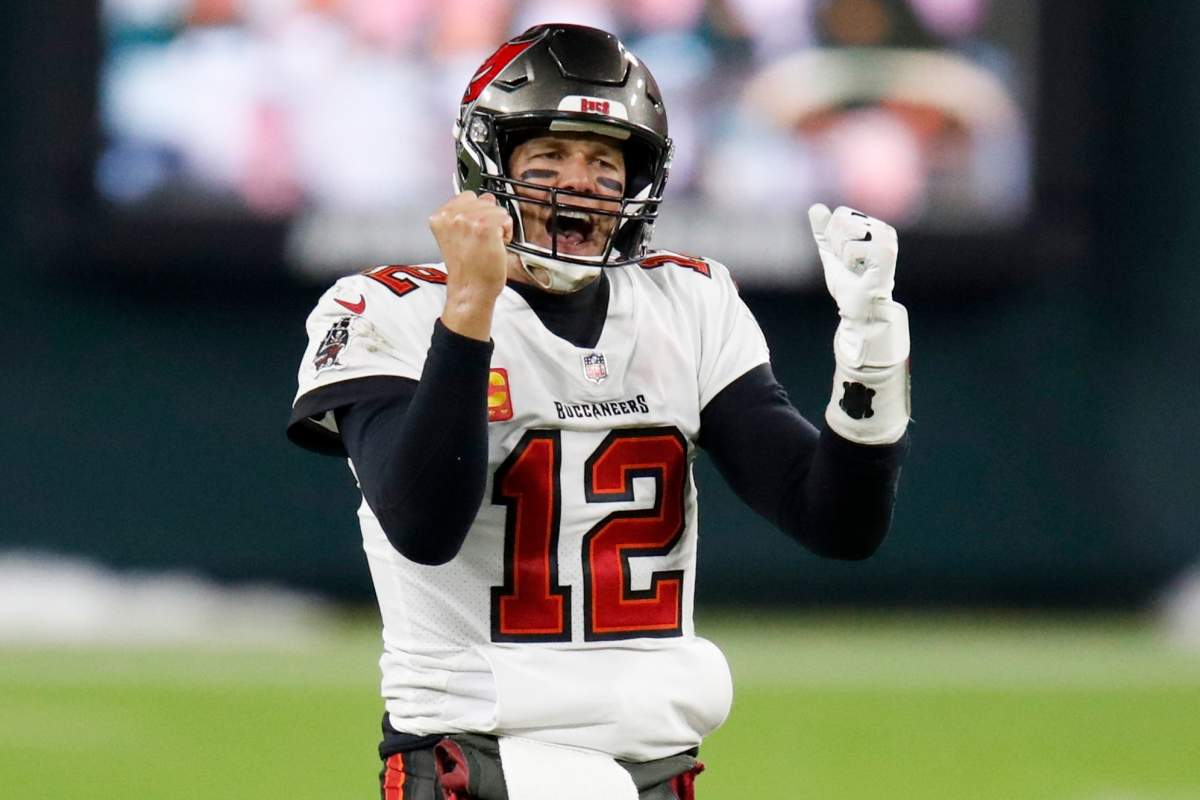 Tampa Bay Buccaneers quarterback Tom Brady reacts after winning the NFC championship game against the Green Bay Packers in Green Bay, Wis., Sunday, Jan. 24, 2021. The Buccaneers defeated the Packers 31-26 to advance to the Super Bowl.