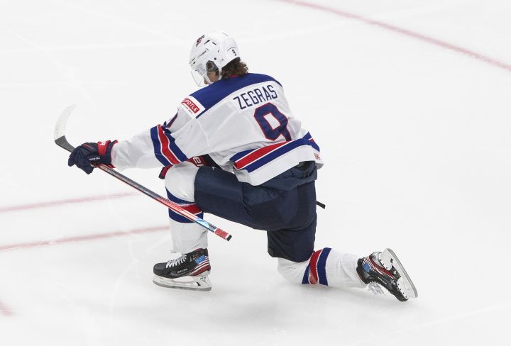 United States’ Trevor Zegras (9) celebrates a goal against Canada during second period IIHF World Junior Hockey Championship gold medal game action in Edmonton on Tuesday, January 5, 2021.