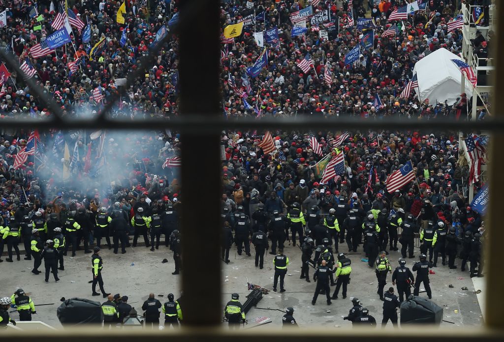 Police hold back supporters of U.S. President Donald Trump as they gather outside the US Capitol’s Rotunda on Jan. 6, 2021, in Washington, D.C.