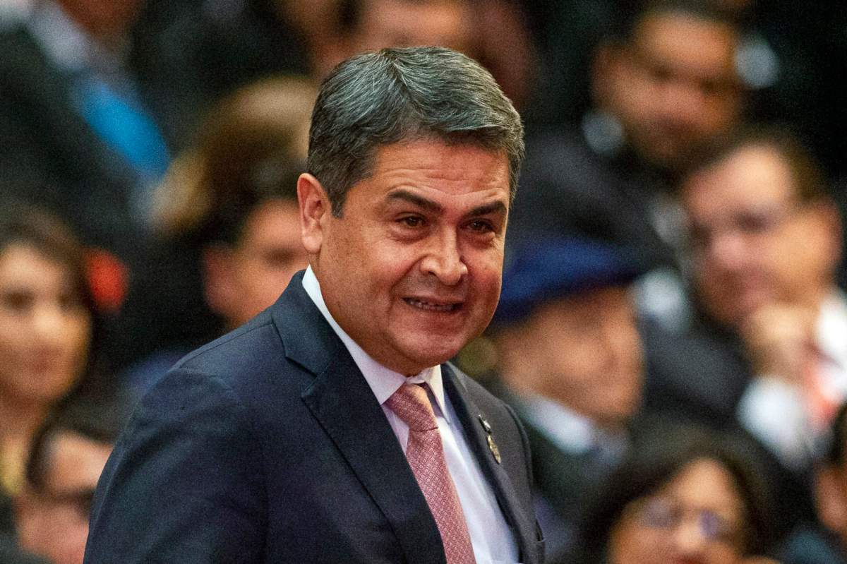 FILE - In this Jan. 14, 2020, file photo, Honduras' President Juan Orlando Hernandez arrives for the swearing-in ceremony for Guatemala's new President Alejandro Giammattei at the National Theater in Guatemala City. Orlando Hernandez denied once again Monday, Feb. 8, 2021, accusations from United States prosecutors that he protected drug traffickers in exchange for bribes. (AP Photo/Moises Castillo, File).
