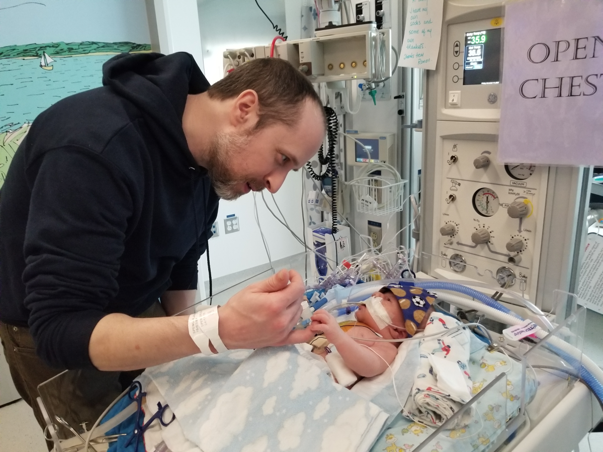 Baby Roman “charming” dad post open-heart surgery (Justina Spencer/Provided)