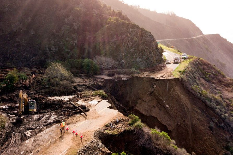 Construction crews work on a section of Highway 1 which collapsed into the Pacific Ocean near Big Sur, California on January 31, 2021.