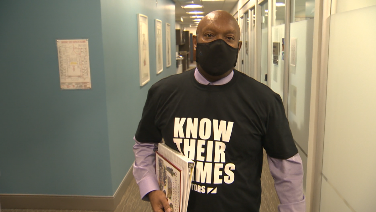 St. Norbert – Seine River councillor Markus Chambers wearing a “Know Their Names” shirt at city hall.