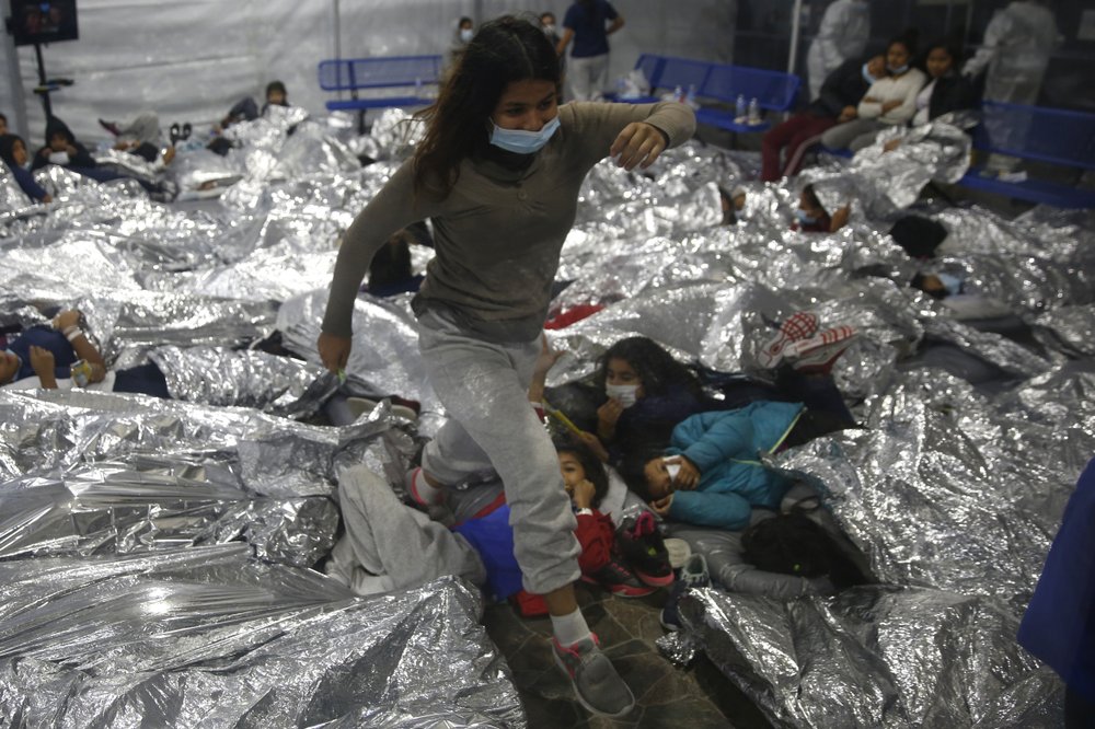 The Biden administration on Tuesday for the first time allowed journalists inside its main detention facility at the border for migrant children, revealing a severely overcrowded tent structure where more than 4,000 kids and families were crammed into pods and the youngest kept in a large play pen with mats on the floor for sleeping.