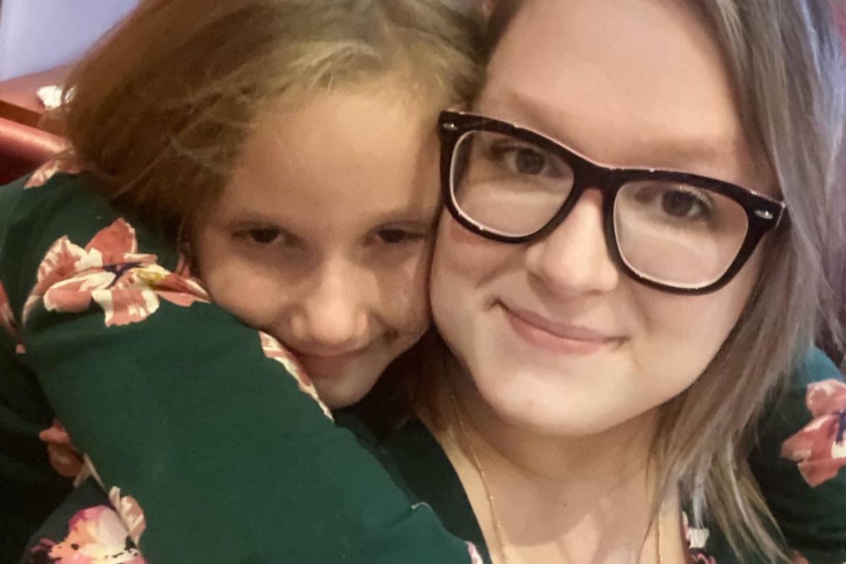 Amberlee Hill shares a smile with her nine-year-old daughter.