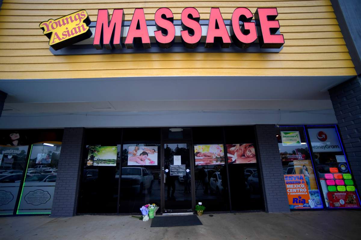 A make-shift memorial is seen outside a business where a multiple fatal shooting occurred on Tuesday, Wednesday, March 17, 2021, in Acworth, Ga.