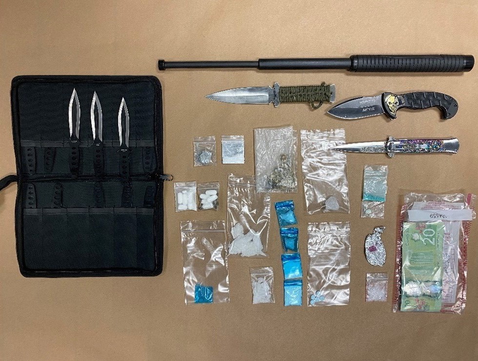 Three people face drug trafficking charges after drugs and weapons were seized from a residence in Cobourg on Thursday.