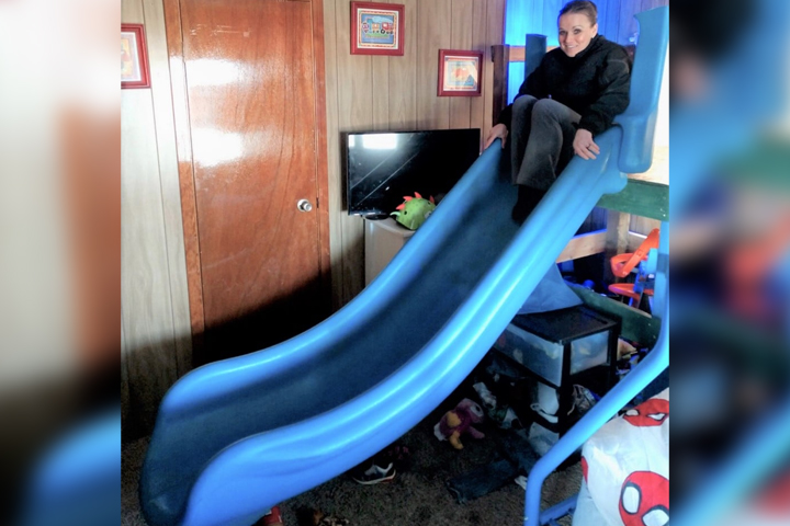 Det. Julie Lee is shown on a missing playground slide inside a suspect's mobile home in Burbank, Wash., in this image released on March 9, 2021. 