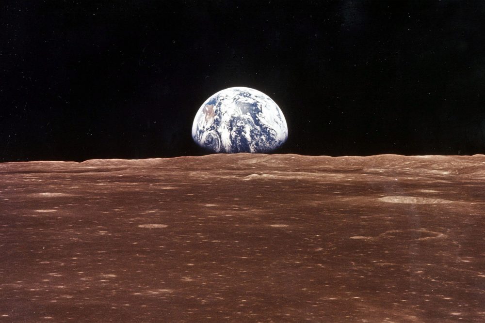 Earth is shown from the moon during the Apollo 11 mission.