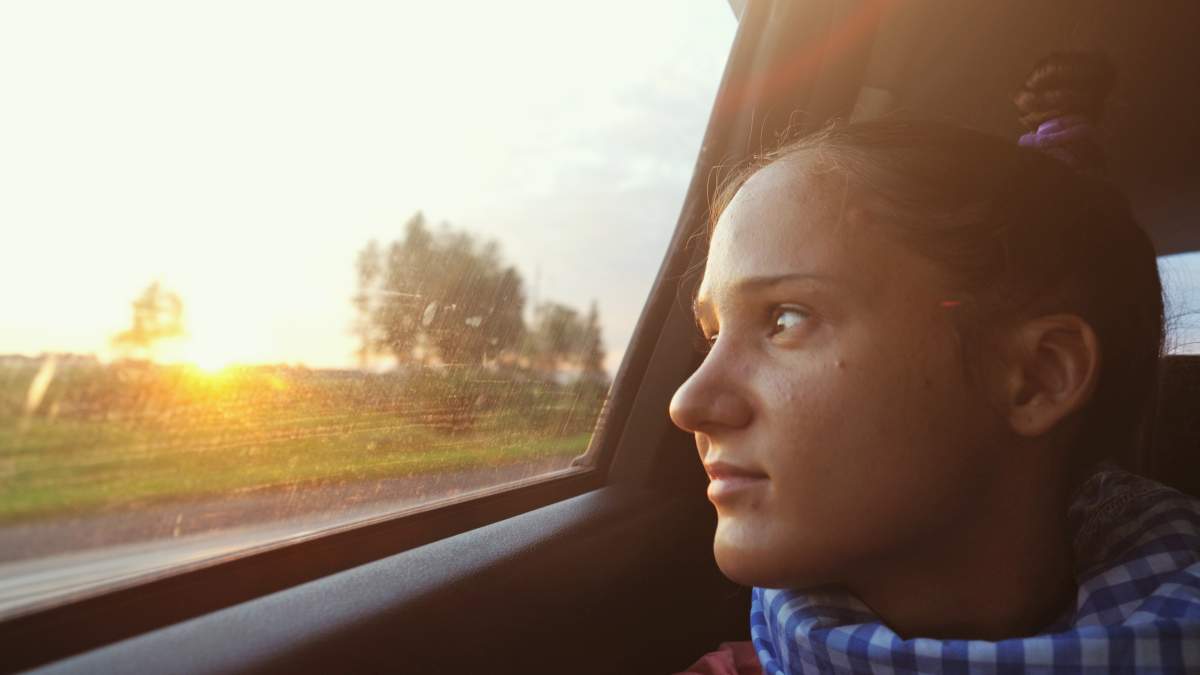 Youth in car.