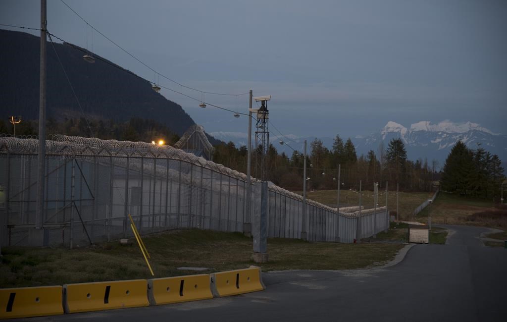 The lockdown at the Mission Institution continues Friday due to fears a drone may have dropped a firearm over the wall.